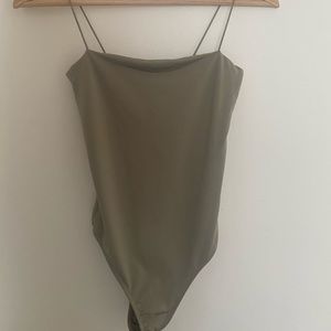 small jade green body suit